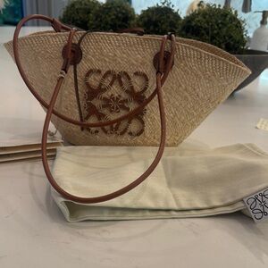 Only used 2 times Loewe small anagram basket bag. In excellent condition.